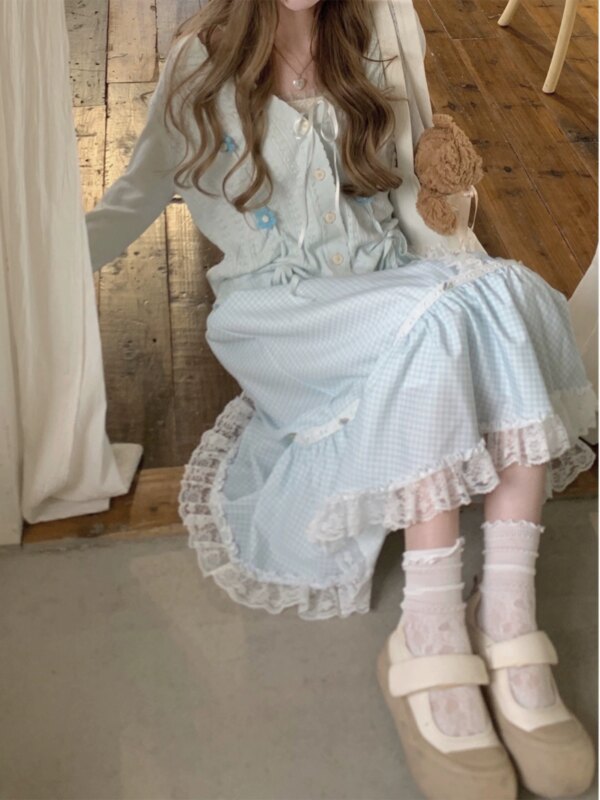 Teenage girl hugging flower cut-out floral knit cardigan